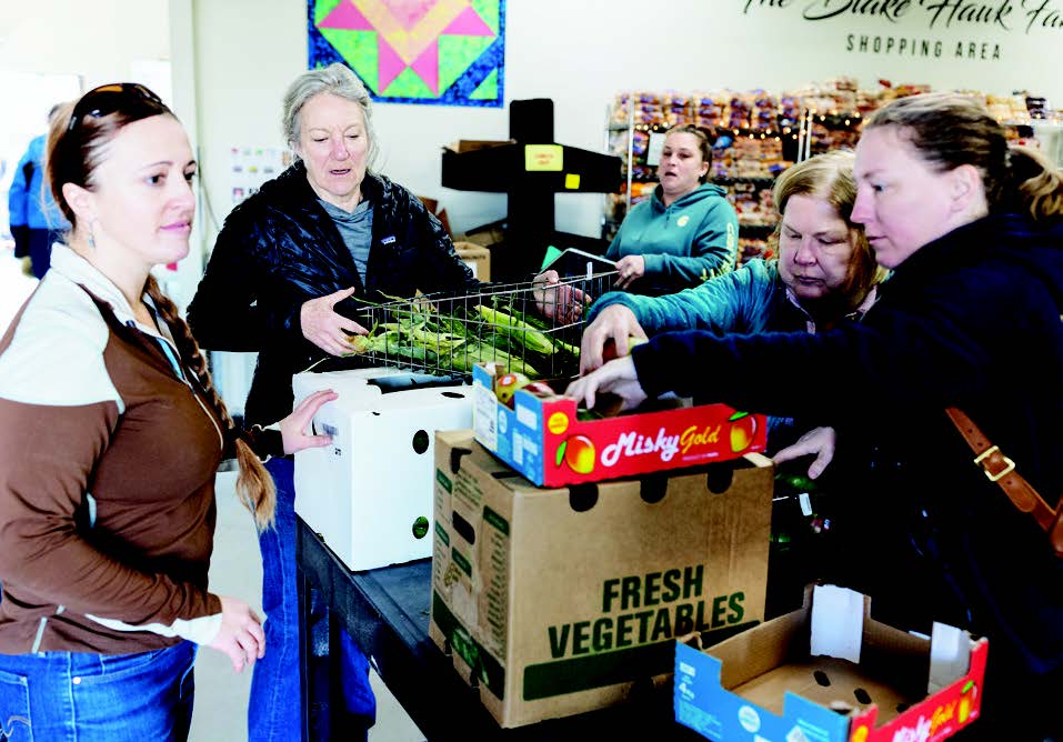 Volunteers Help move groceries during a GCFP Delivery